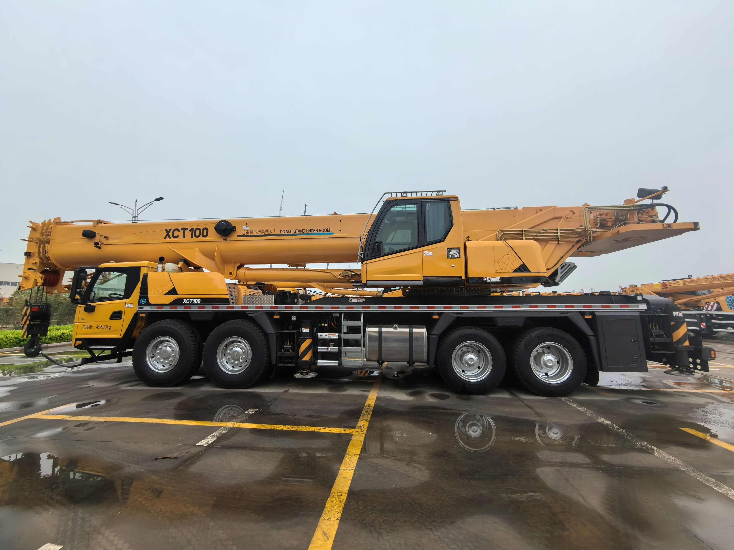 Hot Saling XCT100G5-1 Craein Truck Hiodr&aacute;lacha 100Ton 78m Ardaithe Craein Dleachta Trom ar D&iacute;ol